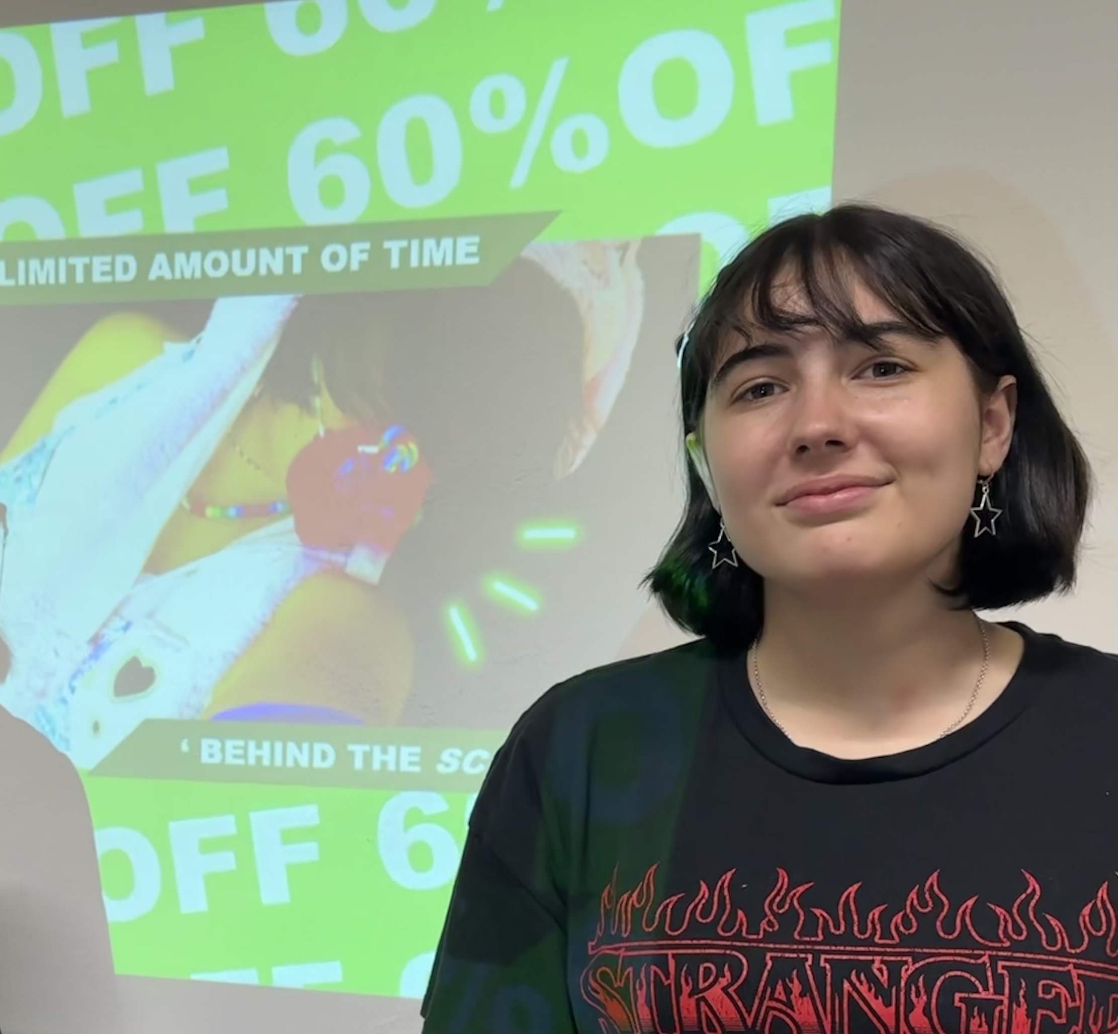 Ashleigh with her work.jpeg